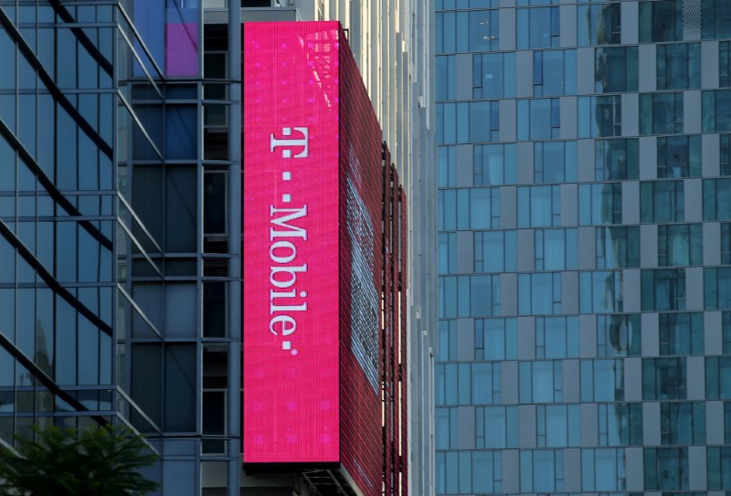 FILE PHOTO: T-Mobile logo is advertised on building sign in Los Angeles
