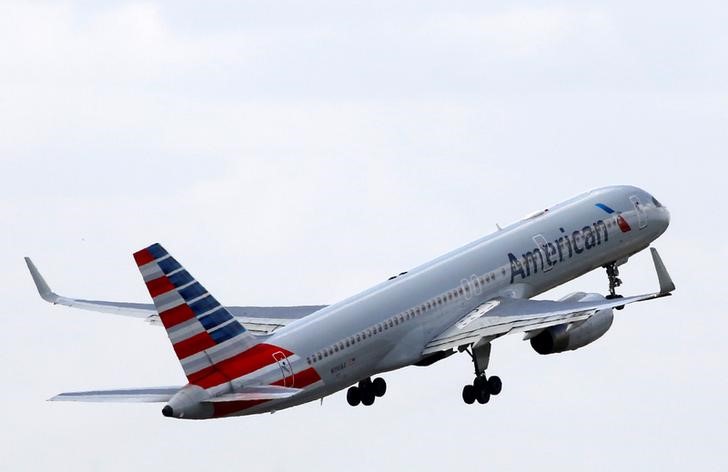 An American Airlines Boeing 757 aircraft takes off at the Charles de Gaulle airport in Roissy