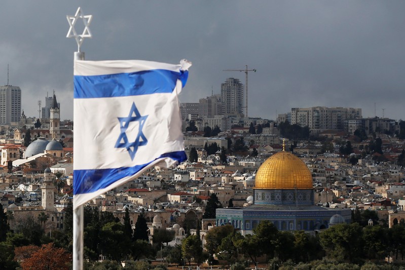 An Israeli flag is seen near the Dome of the Rock, located in Jerusalem's Old City on the compound known to Muslims as Noble Sanctuary and to Jews as Temple Mount