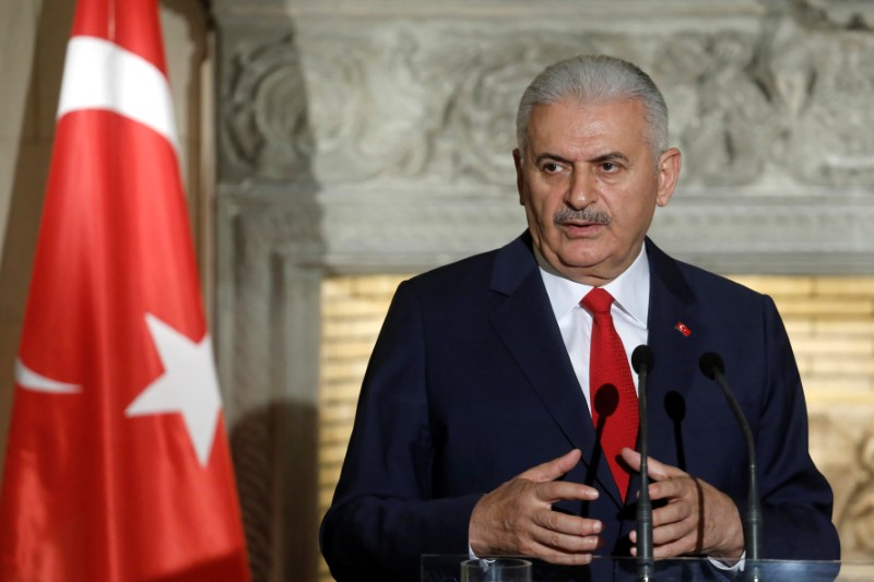 Turkish PM Binali Yildirim speaks during a joint news conference with his Greek counterpart Alexis Tsipras after their meeting at the Maximos Mansion in Athens