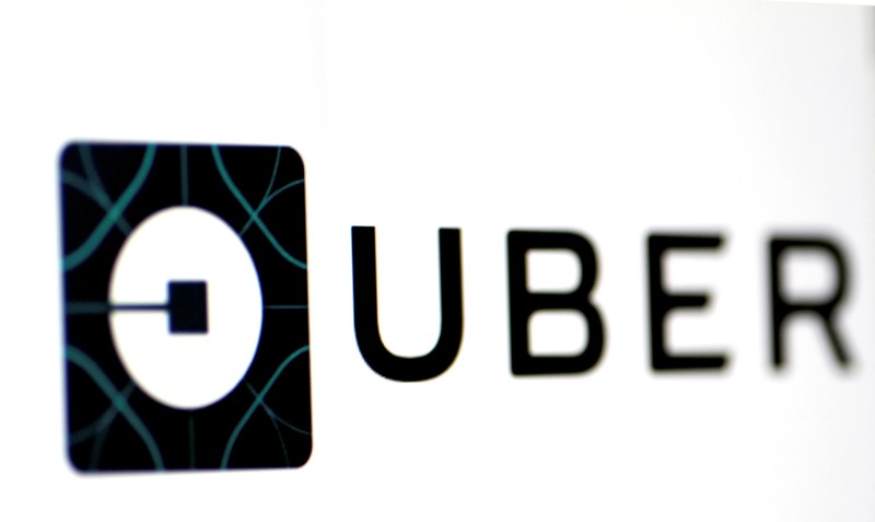 FILE PHOTO - The Uber logo is seen on a screen in Singapore