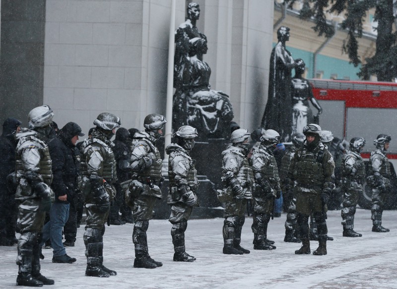 Police officers guard the Parliament building in Kiev