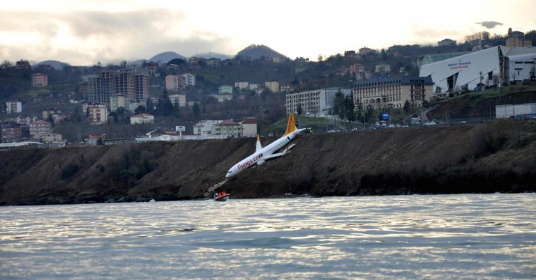 A plane in Turkey skidded off a runway and was left hanging over a cliff, but no one was injured