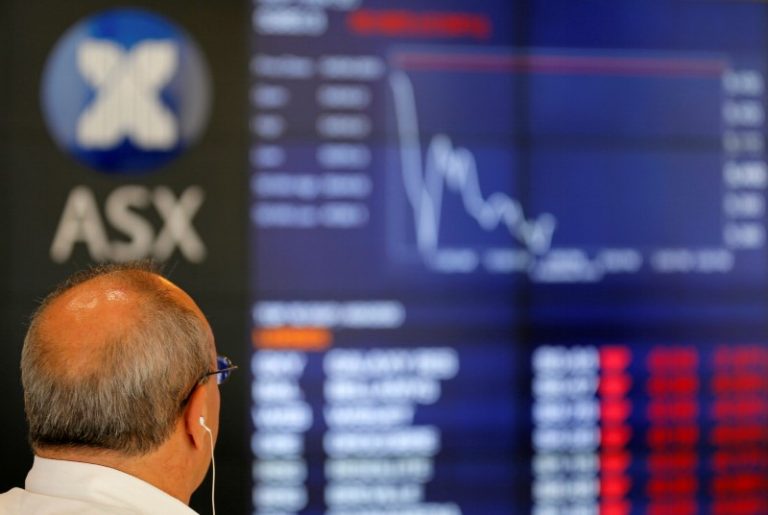 Asia shares extend bull run, dollar crawls off lows