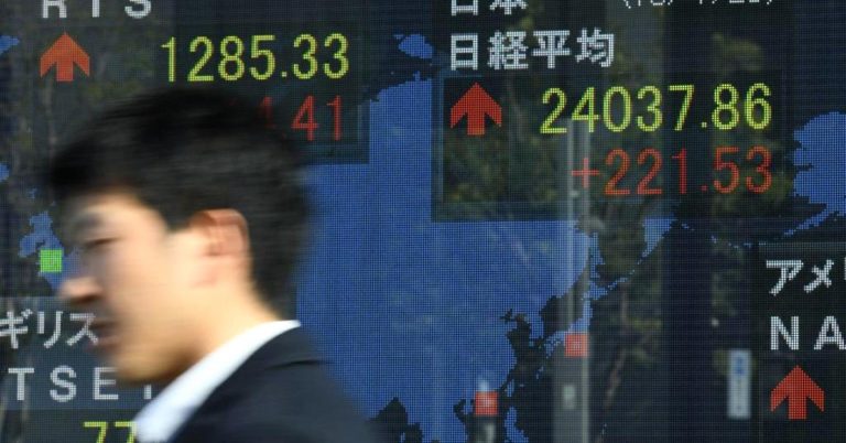 Asian shares gain after Wall Street’s record highs; greater China markets turn lower