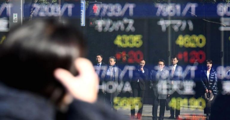 Asian stocks trade mixed as dollar wobbles following overnight gains