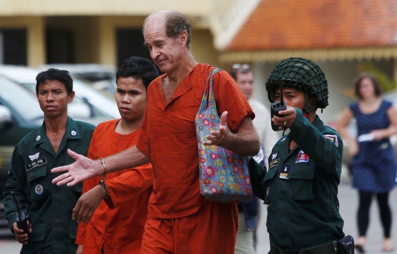 Australian filmmaker James Ricketson walks to the Supreme Court in Phnom Penh, Cambodia