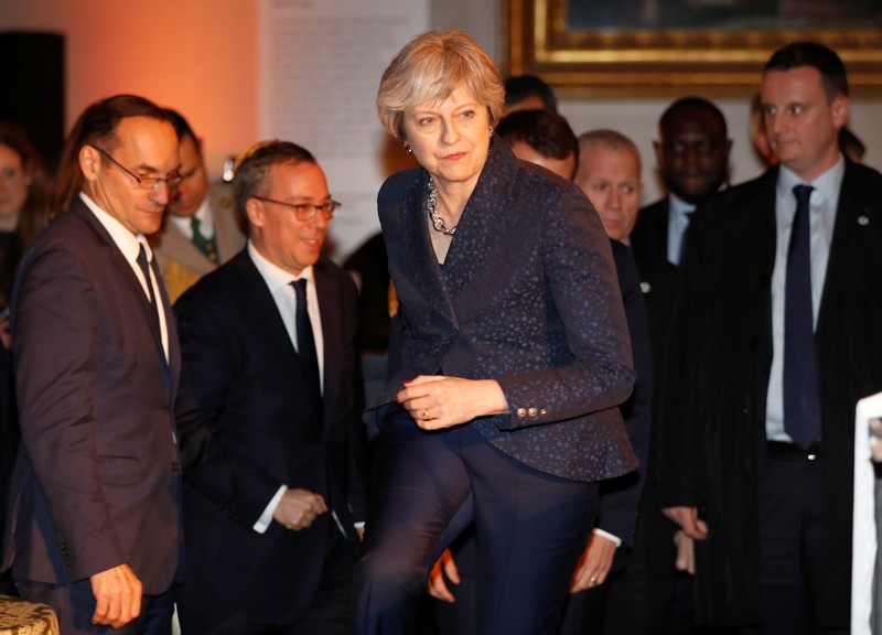 Britain's Prime Minister Theresa May arrives for an official dinner with France's President Emmanuel Macron at the Victoria & Albert Museum in central London