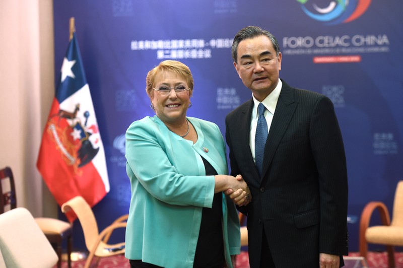 Chile's president Michelle Bachelet and China's Foreign Minister Wang Yi meet at CELAC Forum, in Santiago