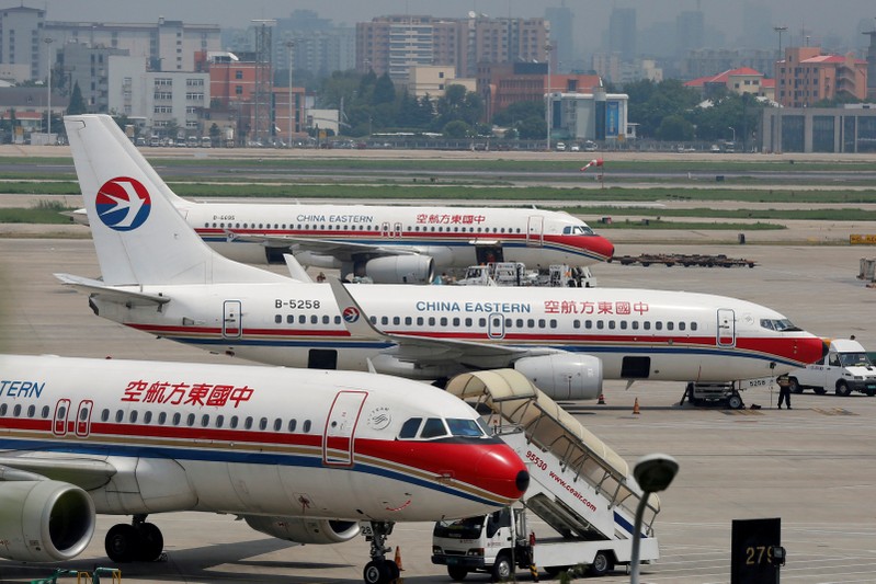 FILE PHOTO: China Eastern Airlines planes are seen on the tarmac at Hongqiao International Airport in Shanghai