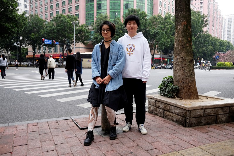 Zhang Leilei and Xiao Meili pose in Guangzhou
