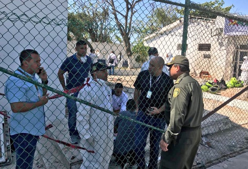 General Jorge Nieto visits the scene of the attack in the District San Jose, where investigators carry out tasks of collecting evidence, in Barranquilla