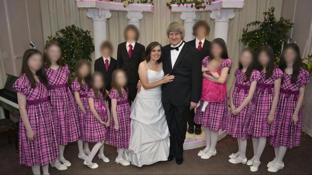 Couple charged with locking up their 13 children