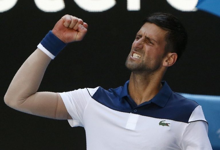 Djokovic survives Melbourne furnace to beat Monfils