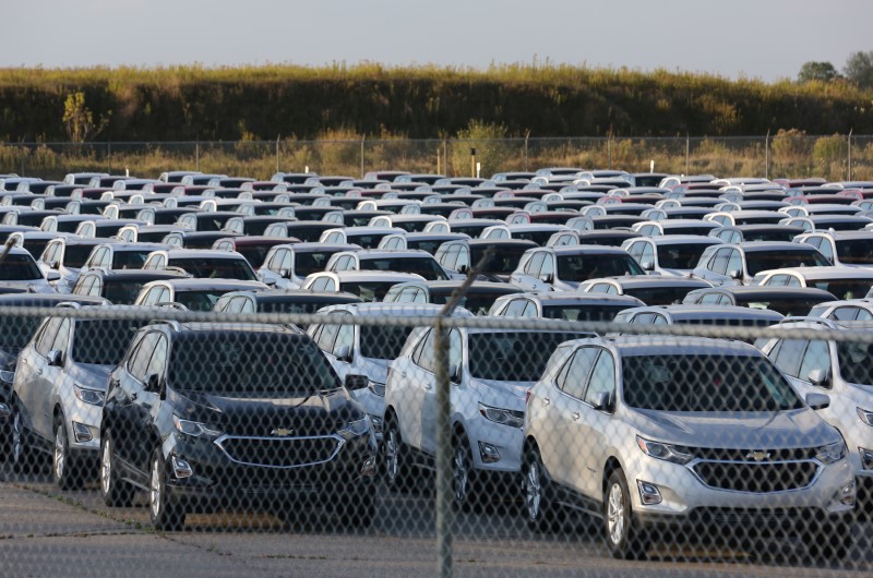 Chevrolet Equinox SUVs are parked awaiting shipment near the General Motors Co (GM) CAMI assembly plant in Ingersoll
