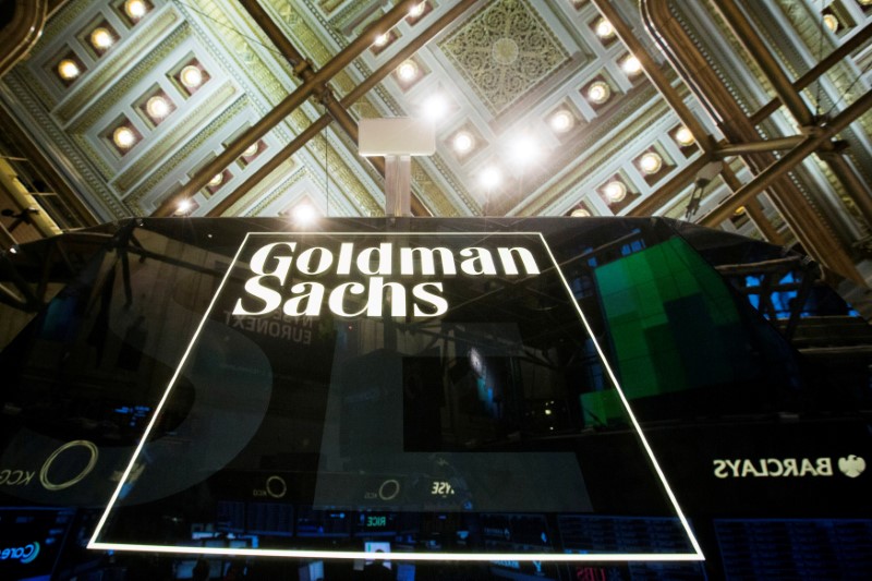 FILE PHOTO - Goldman Sachs sign is seen above floor of the New York Stock Exchange shortly after the opening bell in the Manhattan borough of New York