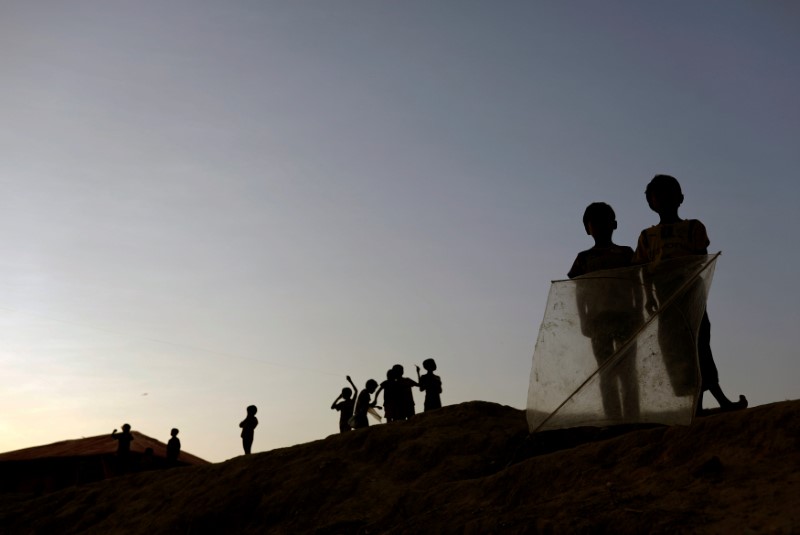 Rohingya refugee children play kites at Balukhali refugee camp