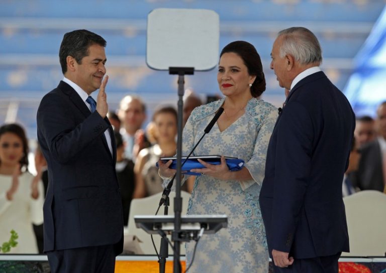 Honduran president sworn in amid protests after election chaos