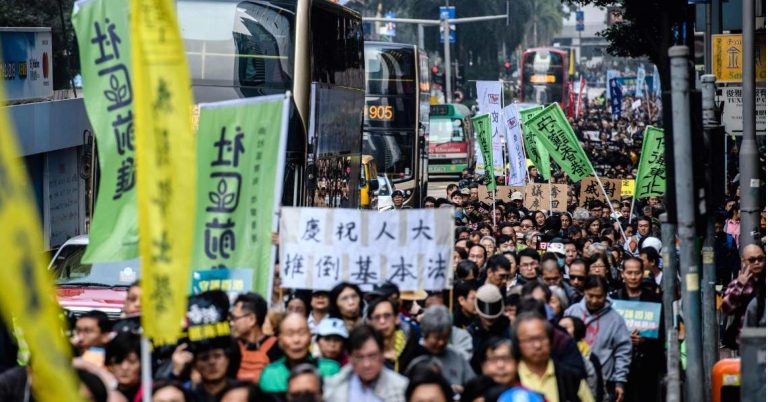 Hong Kong’s leader defends a plan many say undermines independent legal system