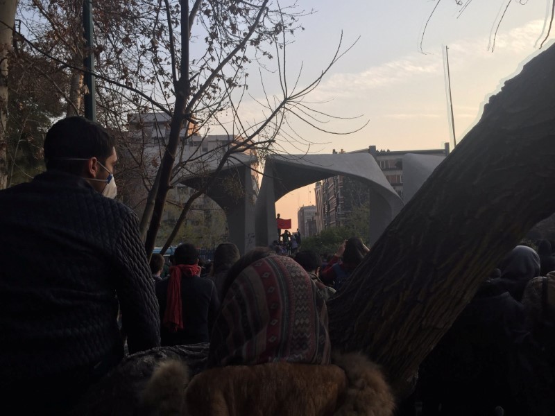 People protest near the university of Tehran