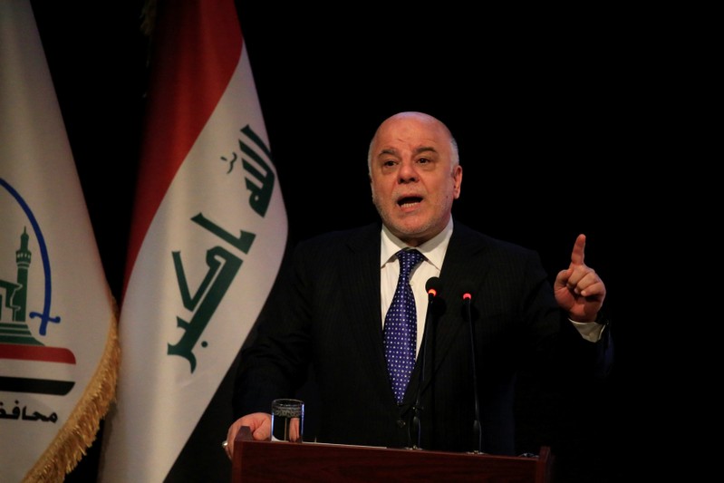 Iraq's Prime Minister Haider al-Abadi speaks during a ceremony in Najaf
