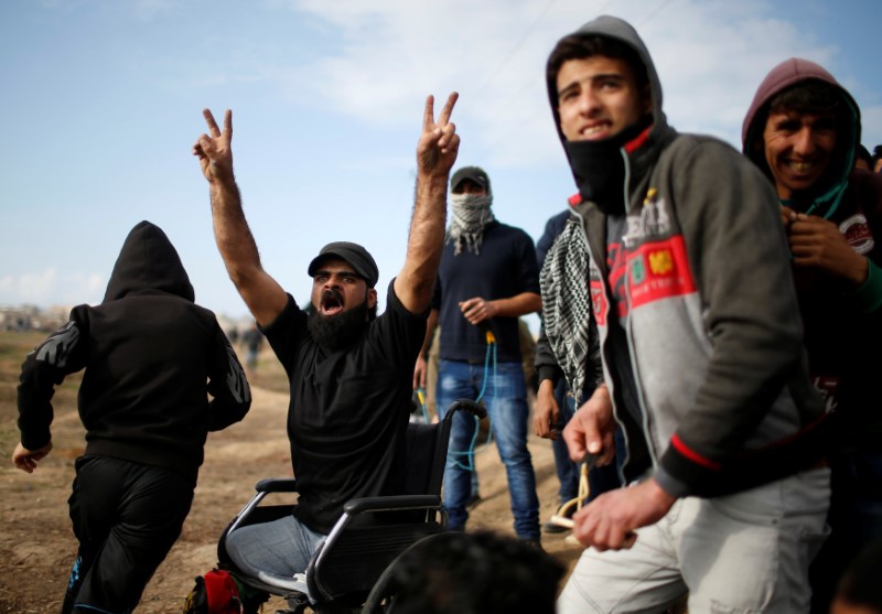 Wheelchair-bound Palestinian demonstrator Ibrahim Abu Thurayeh gestures before he was killed during clashes with Israeli troops on Friday at a protest near the border with Israel in the east of Gaza City