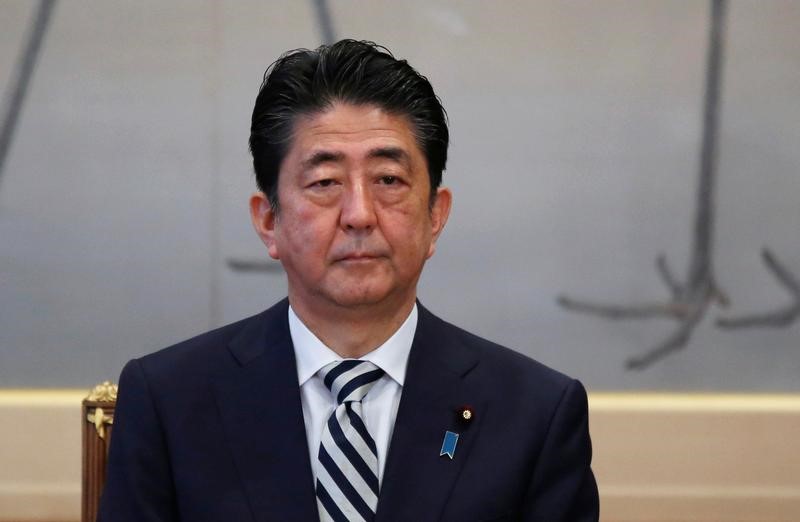 Japan's PM Abe attends a meeting of the Imperial Household Council to discuss the timeline for the abdication of Japan's Emperor Akihito at the Imperial Household Agency in Tokyo
