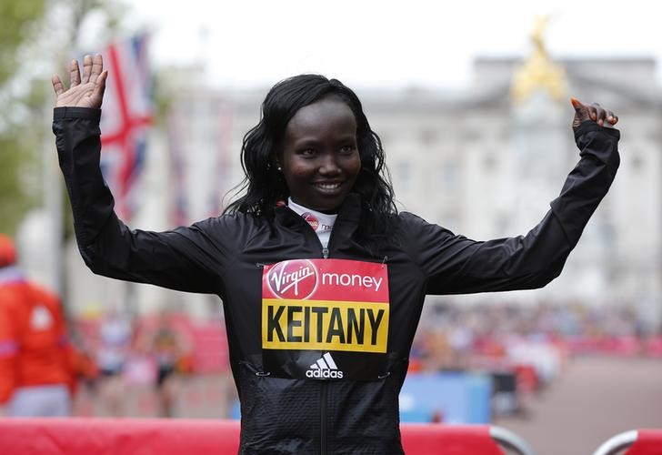 Kenya's Mary Jepkosgei Keitany celebrates winning the Women's Elite race