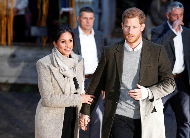Britain's Prince Harry and his fiancee Meghan Markle leave after visiting radio station Reprezent FM, in Brixton, London
