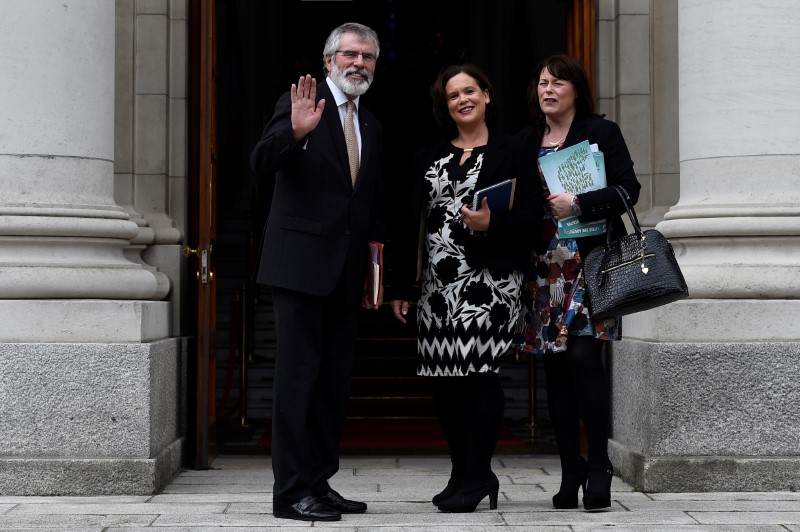 Sinn Fein President Gerry Adams, Deputy leader Mary Lou McDonald and Michelle Gildernew wave on the steps of Government buildings ahead of a meeting with Prime Minister of Ireland Leo Varadkar in Dublin