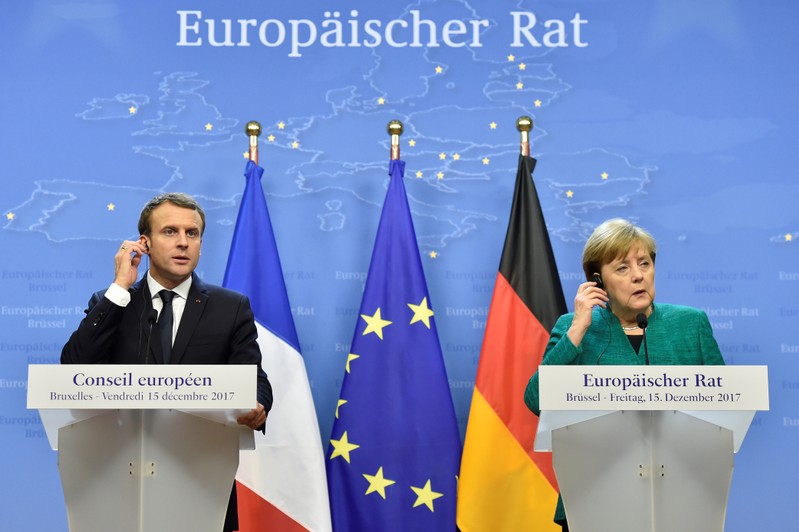 French President Macron and German Chancellor Merkel give a joint news conference in Brussels
