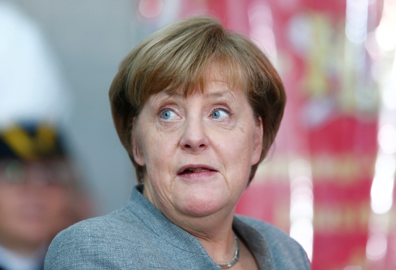 German Chancellor Angela Merkel attends a reception of German carnival societies at the Chancellery in Berlin