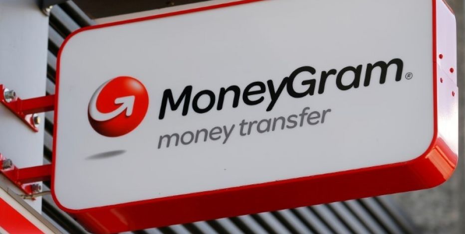 FILE PHOTO - A Moneygram logo is seen outside a bank in Vienna, Austria, June 28, 2016. REUTERS/Heinz-Peter Bader/File Photo