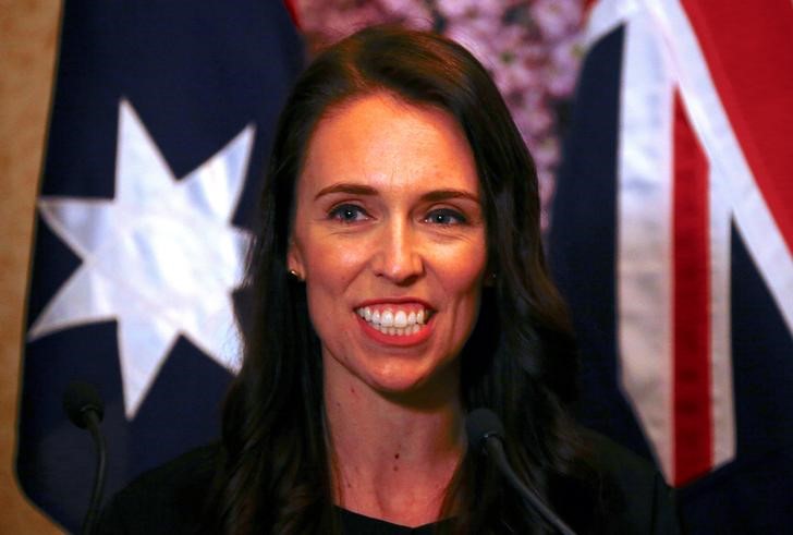 New Zealand Prime Minister Jacinda Ardern smiles as she answers a question during a media conference in Sydney