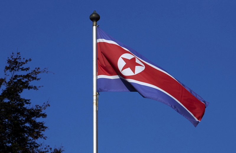 FILE PHOTO - North Korean flag flies on a mast at the Permanent Mission of North Korea in Geneva