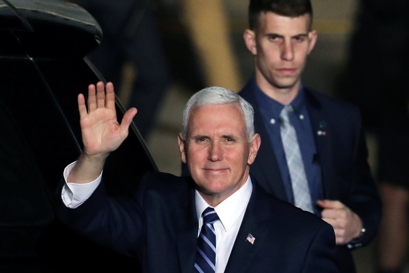 U.S. Vice President Mike Pence waves upon their arrival at Ben Gurion international Airport in Lod, near Tel Aviv, Israel