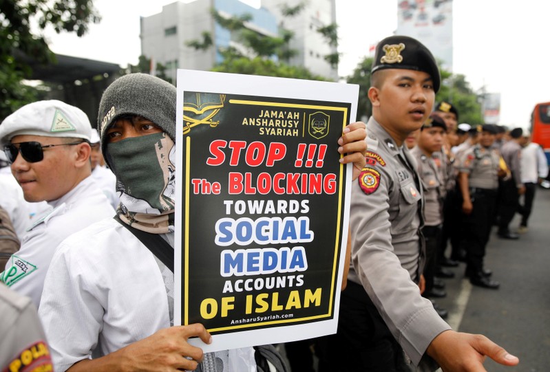Muslim protesters rally outside the local Facebook office, angry over the social media giant's blocking of some sites, in Jakarta