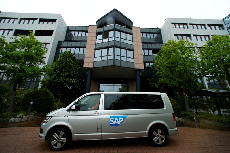 FILE PHOTO: A car with the logo of German software group SAP stands near its headquarters in Walldorf