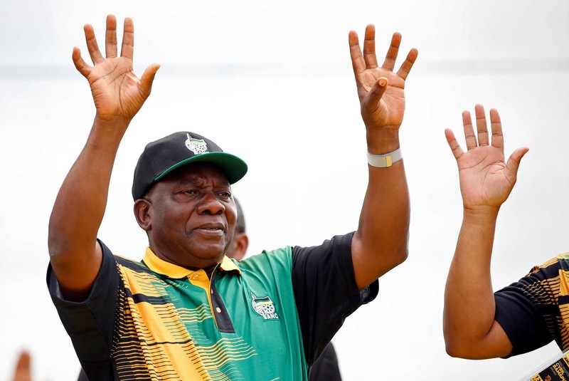 President of the ANC Cyril Ramaphosa waves to supporters ahead of the ANC's 106th anniversary celebrations, in East London