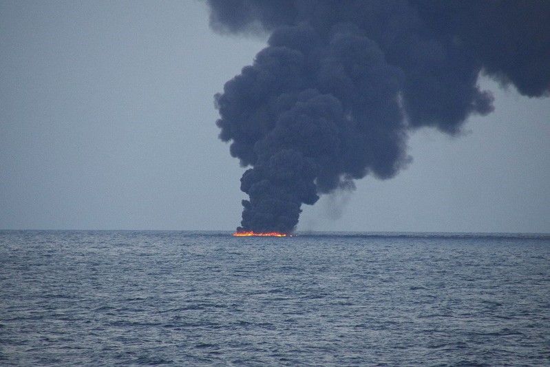 Flames and smoke from the Iranian oil tanker Sanchi is seen in the East China Sea