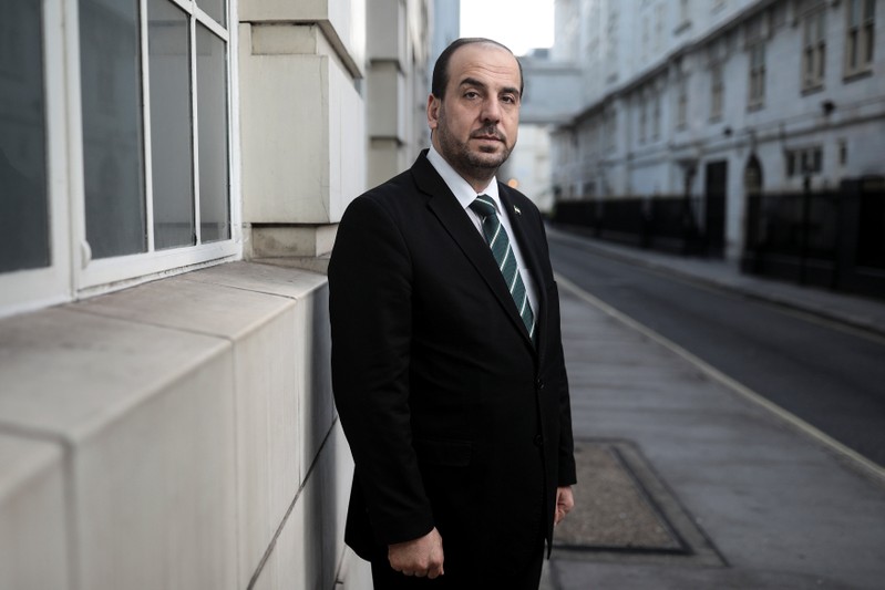 Nasr Hariri, chief negotiator for Syria's main opposition, poses for a photograph in central London