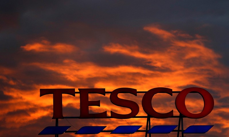 FILE PHOTO: A company logo is pictured outside a Tesco supermarket in Altrincham northern England.