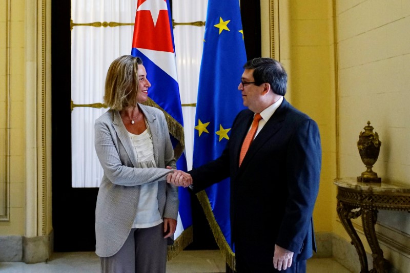 EU foreign policy chief Federica Mogherini shakes hands with Cuba's Foreign Minister Bruno Rodriguez in Havana