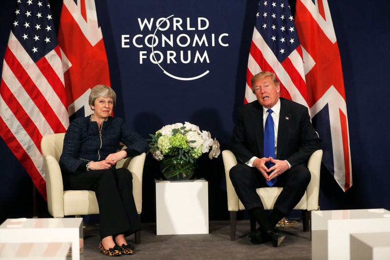 U.S. President Donald Trump meets with Britain's Prime Minister Theresa May during the World Economic Forum (WEF) annual meeting in Davos