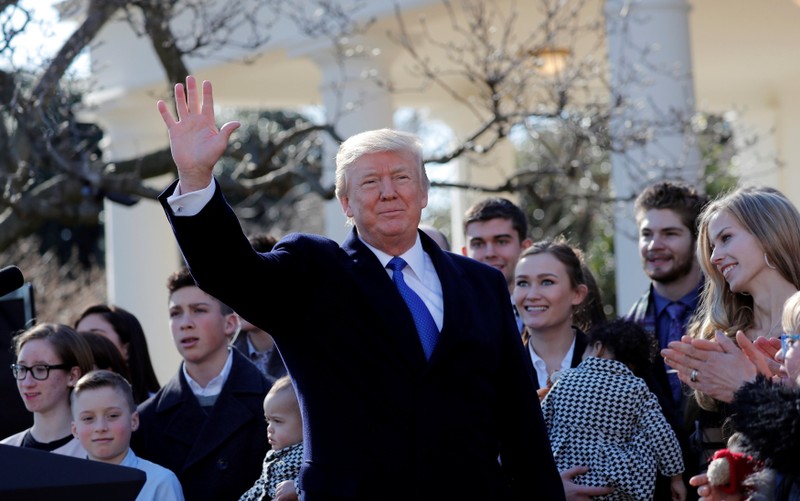 U.S. President Donald Trump waves after addressing the annual March for Life rally, taking place on the National Mall, from the White House Rose Garden in Washington