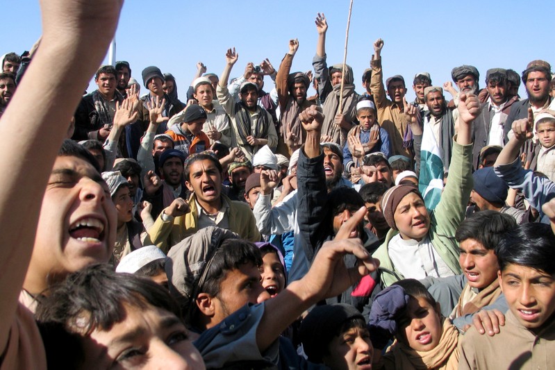 People chant slogans as they take part in an anti-U.S. rally in Chaman