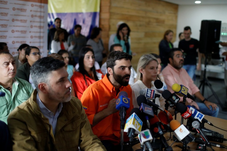 Juan Andres Mejia, lawmaker of the opposition party Popular Will (Voluntad Popular), talks to the media during a news conference in Caracas
