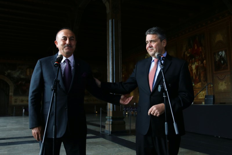 German Foreign Minister Gabriel and his Turkish counterpart Cavusoglu attend a news conference in Goslar
