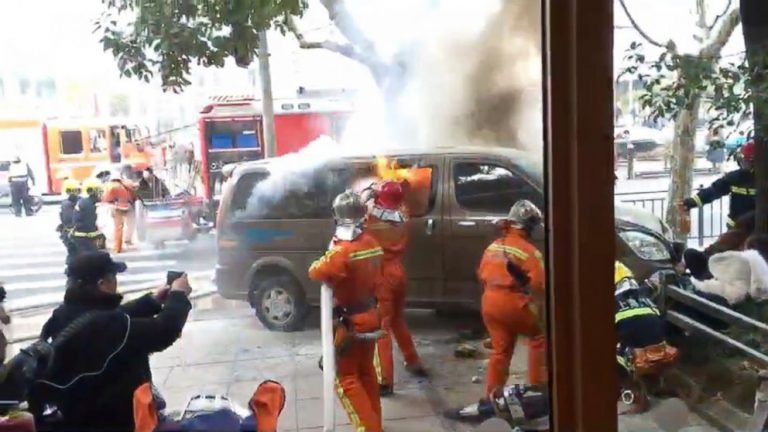 18 injured as burning van jumps curb in China; government rules out terrorism