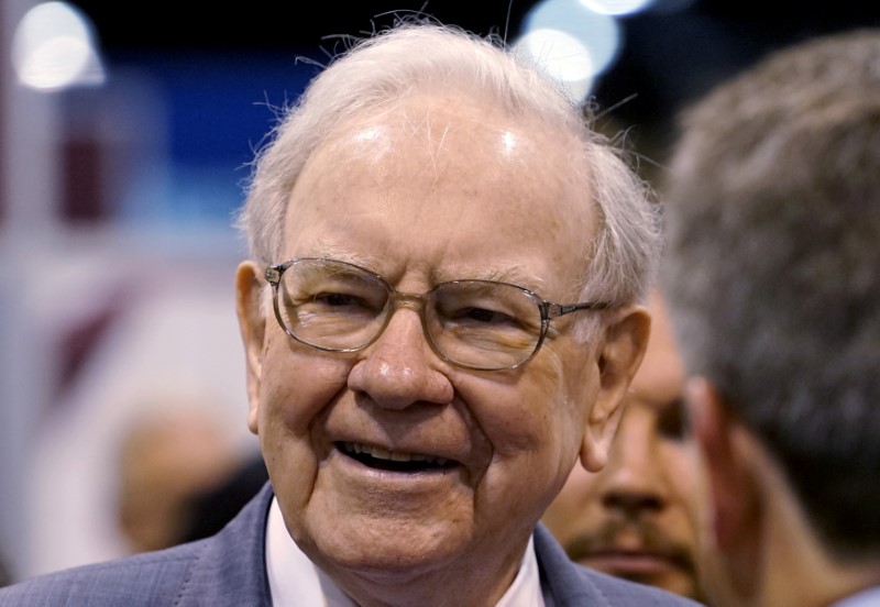 FILE PHOTO: Berkshire Hathaway CEO Buffett talks to reporters prior to the Berkshire annual meeting in Omaha